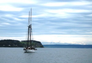 Image of the schooner Adventuress approaching the dock.