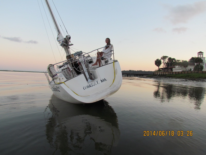 sailboat aground and listing, anchoring too close to shore