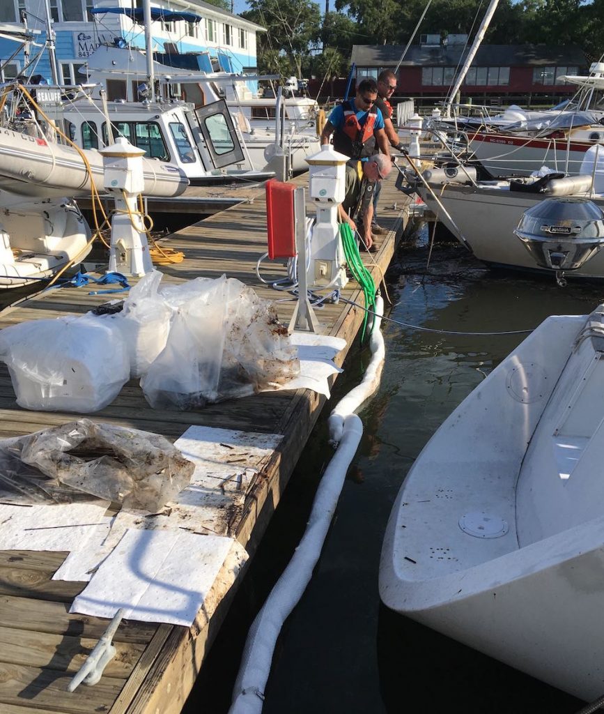 oil spill cleanup crew starts work on oil spill at Lady's Island Marina