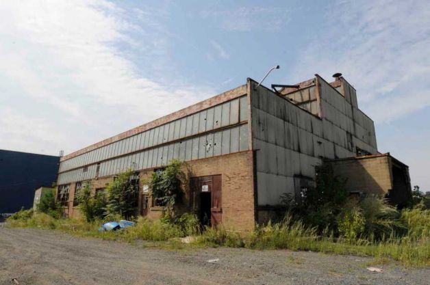 Image of abandoned factory showing need for site repair