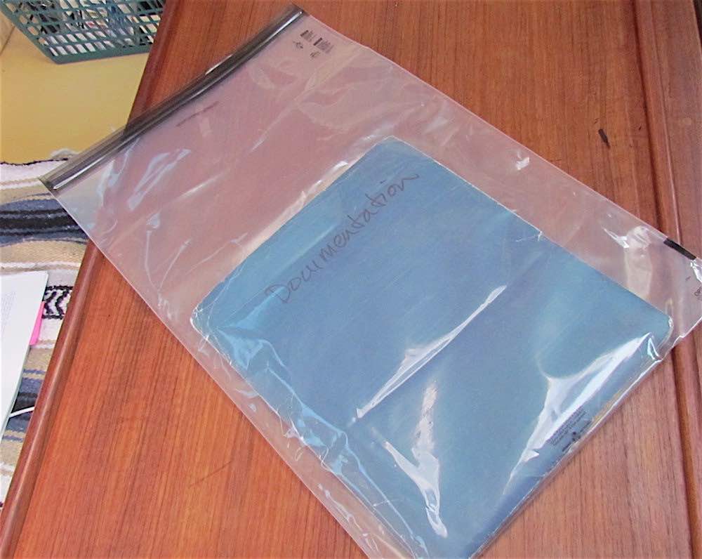 documents in a clear pouch to be stored on a boat.