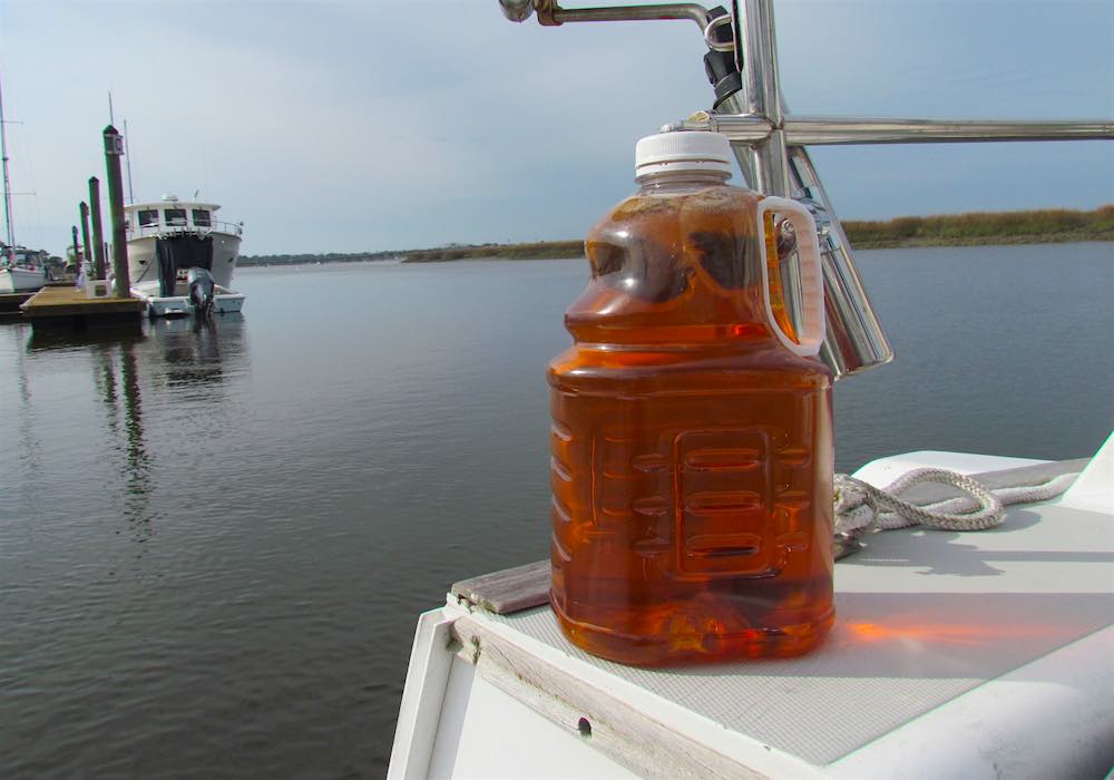 a jug of sun tea on sail boat